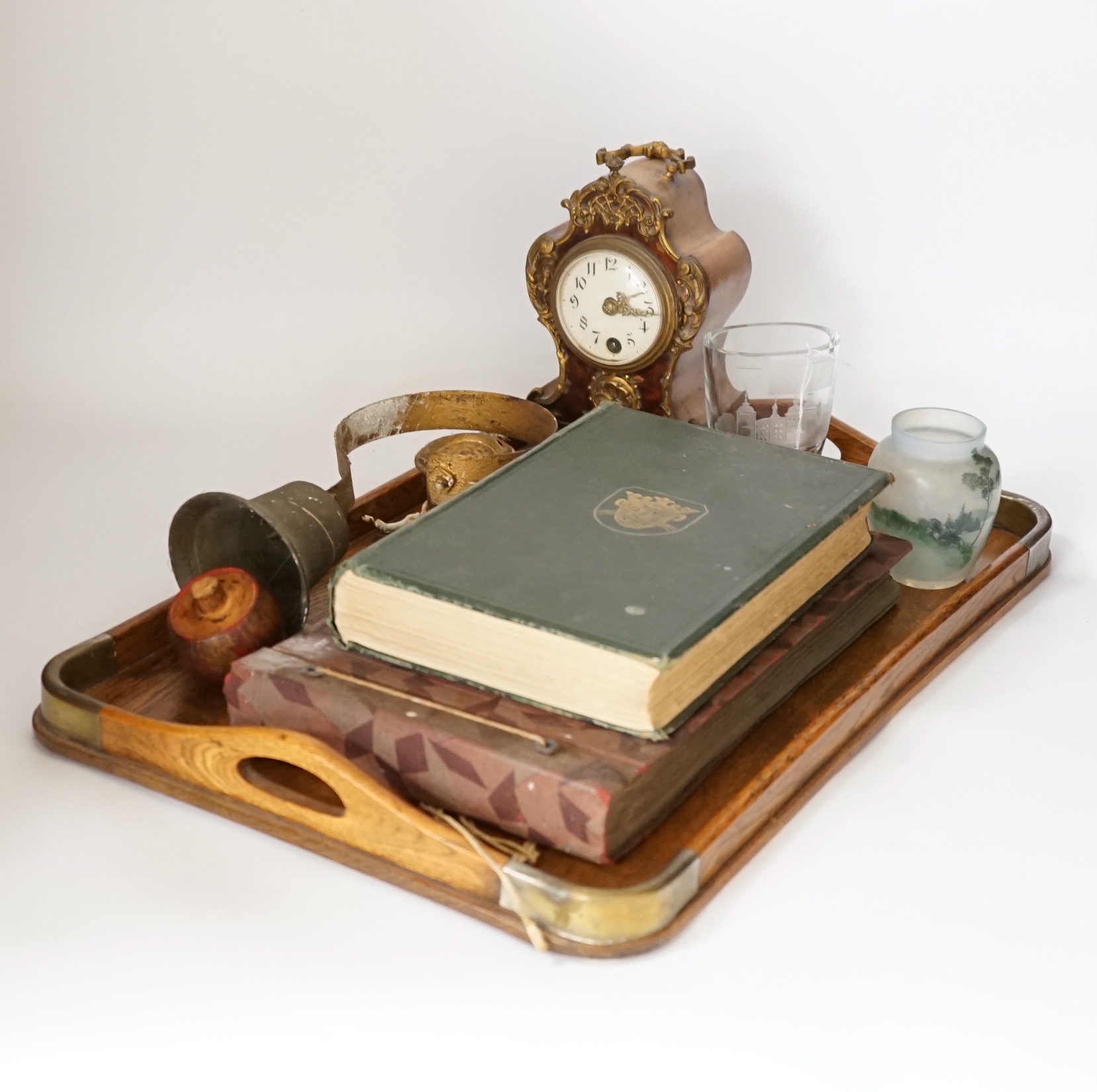 A clock and a bell, two glass vases, volume of Cripps Old English Plate a photograph album and tray